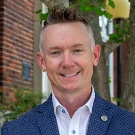 Andrew Allen smiling at camera