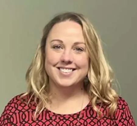 Jeannette Flynn smiling at camera