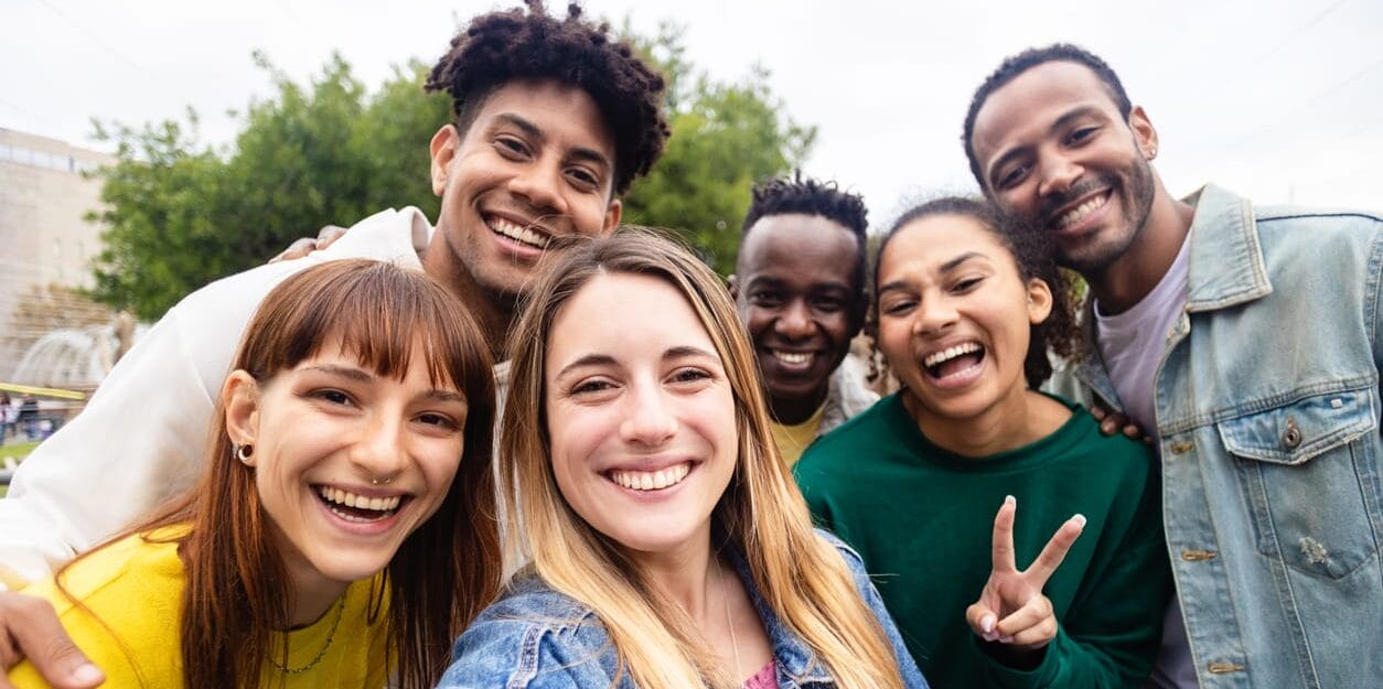Group of young people taking selfie portrait
